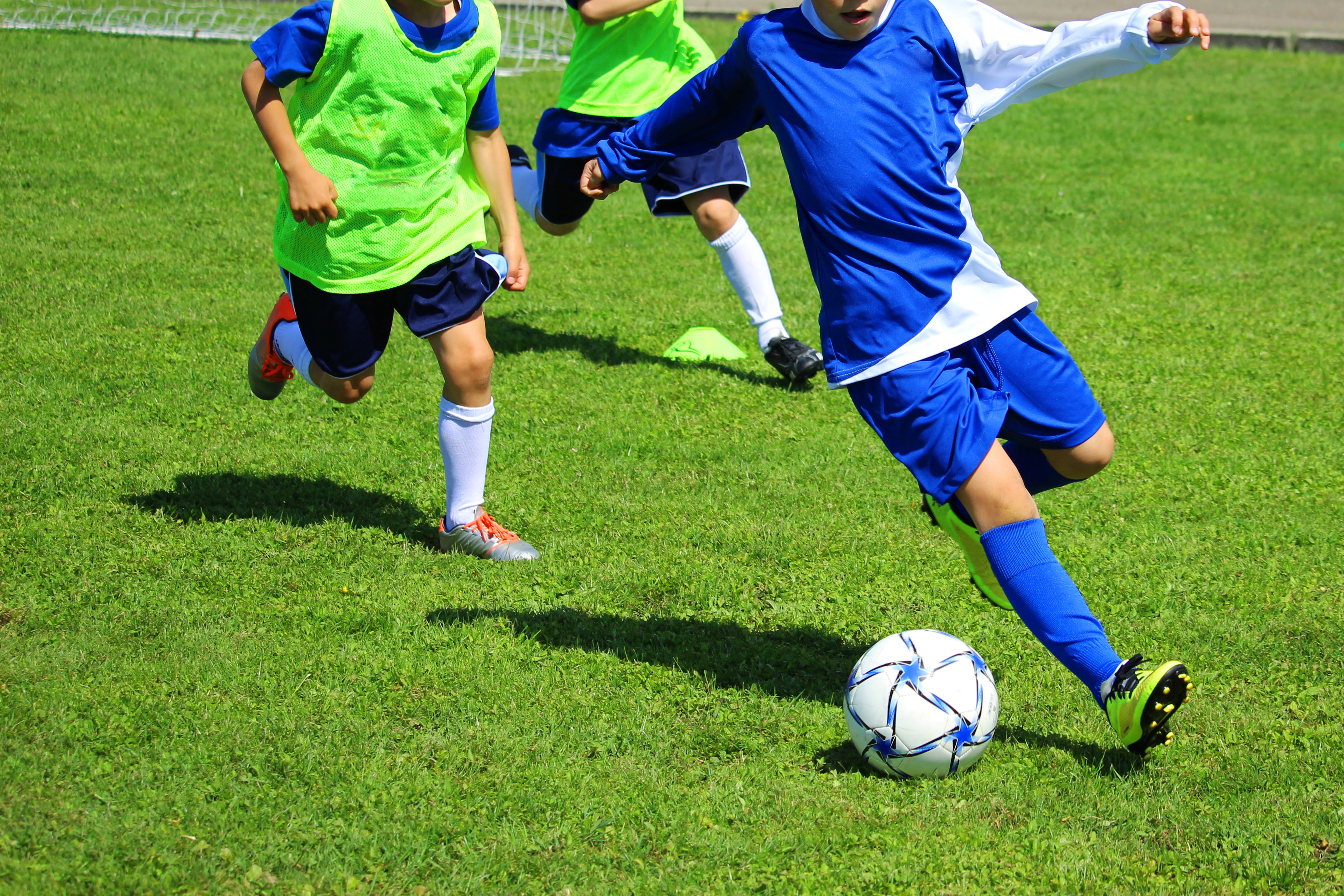 Youth Soccer Kicking Ball